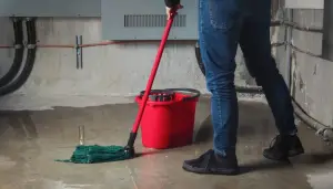 plumber cleaning up a leak