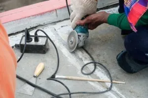 worker fixing slab leak