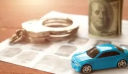 toy car with handcuffs and money roll