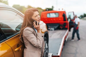 woman calling for help after crash