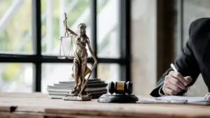 scales of justice on a lawyer’s desk