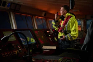 Person looking out over a ship deck