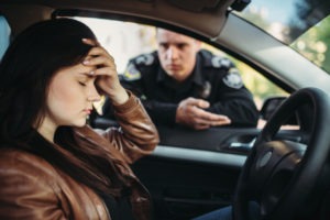 cop pulling over distraught woman