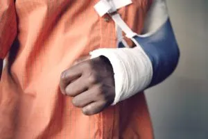 closeup of a man with a broken arm