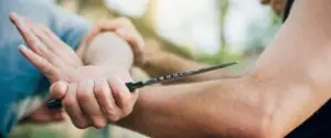 self-defense disarming technique against knife attack