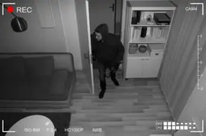 cctv footage of thief entering house with crowbar