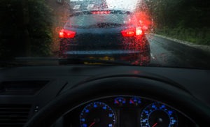 a car following close behind the vehicle in front of it