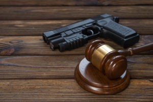 gun next to gavel