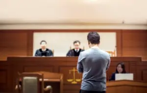 man standing trial in court