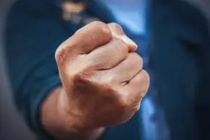 man’s clenched fist