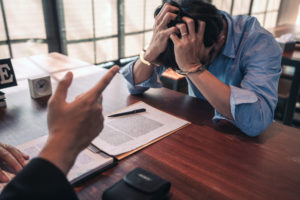 Suspect being threatened by an agent