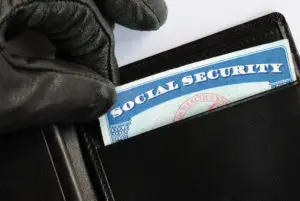 person stealing Social Security card