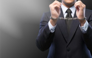 businessman in handcuffs