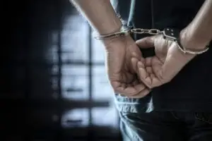 arrested man in handcuffs