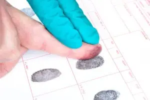 person being fingerprinted