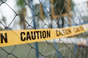 caution tape on a fence