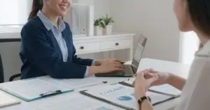 real estate agent working with clients