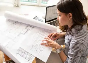 female architect reviewing plans