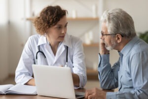 man talking to doctor