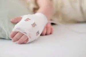 child’s hand in a bandage