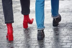 people walking on slippery paving