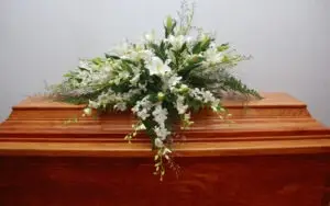 lilies on a coffin