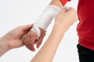 little boy with damaged hand