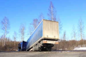 semi-truck in ditch