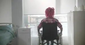 woman in pink in wheelchair