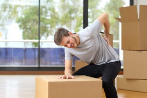 injured worker with boxes