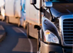 A line of large trucks. Find out how to build a legal claim with a Ventura truck accident lawyer.