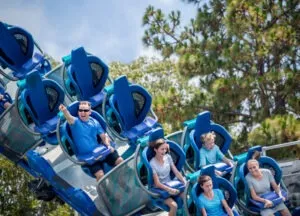 People ride a roller coaster. Learn how a personal injury attorney can recover damages after a Disneyland accident.