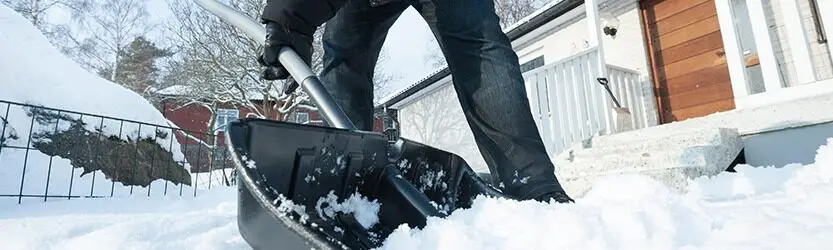 Image of someone shoveling snow