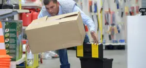 Person Falling in a Store with a Box