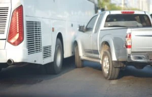 Pick-up truck bump Bus by accident on traffic jam