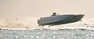 A boat jumping out of the water.