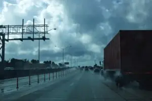 Vehicles driving on a rainy Florida highway