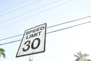A 30 mile-per-hour speed limit sign.