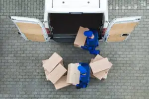 delivery men unloading a delivery truck