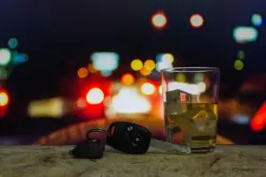 car key and shotglass