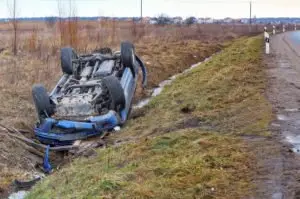 car rolled over in a ditch