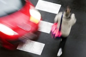 crosswalk with pedestrian about to be hit