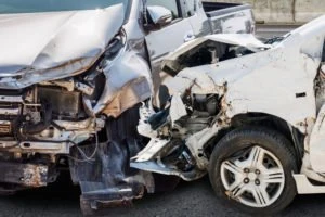 truck and car in a severe accident