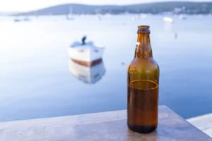 beer bottle left on the dock