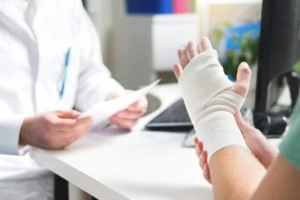 injured patient consults with a doctor