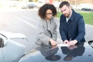 motorists exchange contact information after a crash
