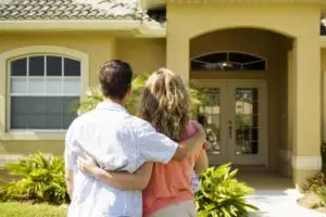 new homeowners admire their first home