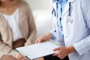 patient consults with her doctor