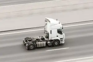 truck without a trailer bobtails down the highway