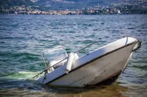 damaged boat sinking